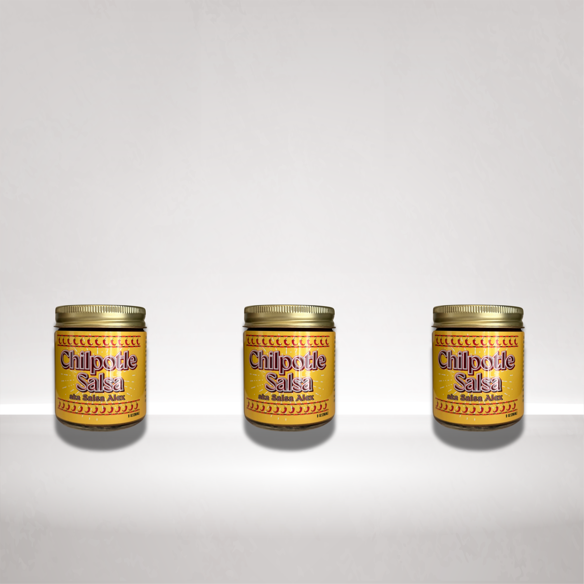 Three jars of Chilpotle Salsa arranged side by side on a white surface against a light gray background.